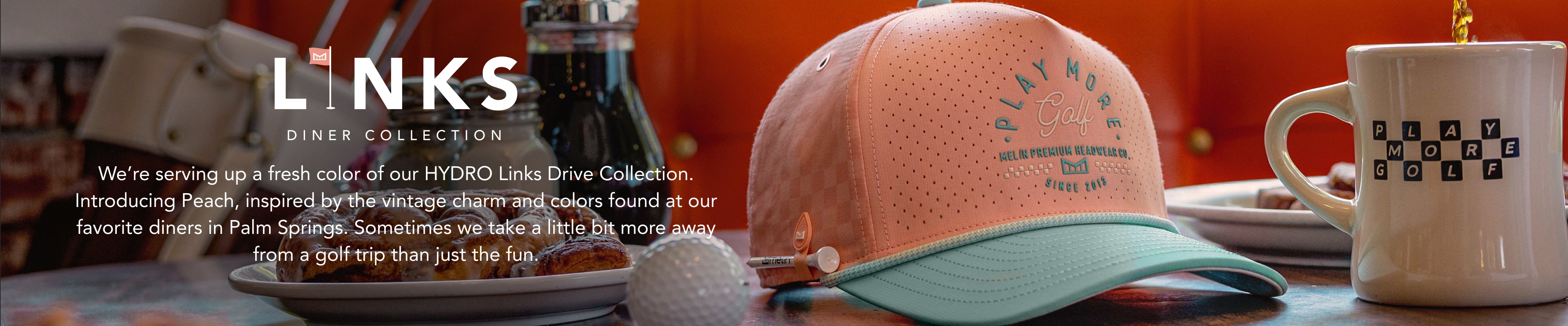 The Odysea Links Hydro in Peach Nectar featured in the melin Links Diner collection against a diner background