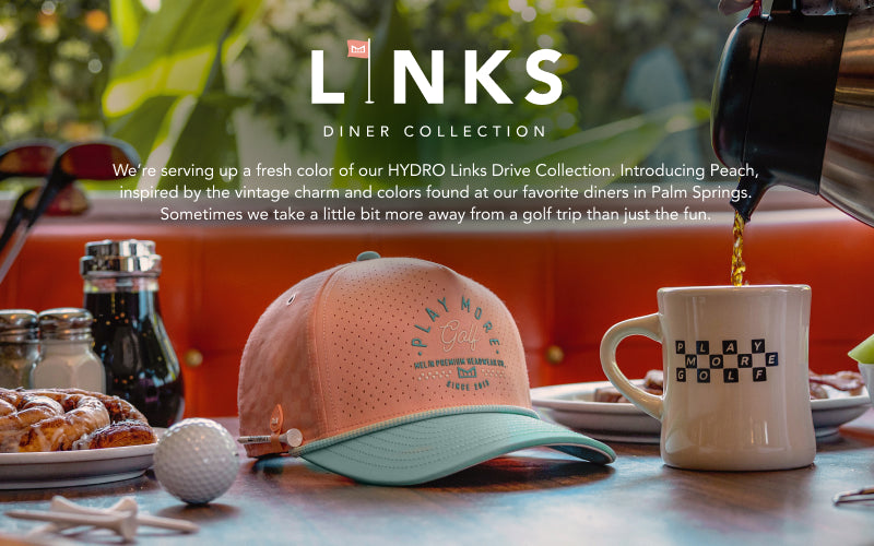 The Odysea Links Hydro in Peach Nectar featured in the melin Links Diner collection against a diner background