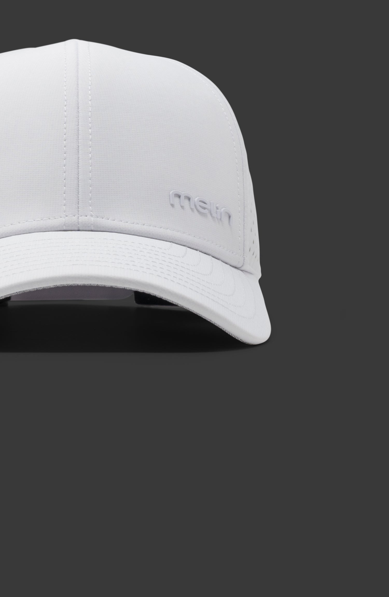 The melin Compass Hydro in White against a black background