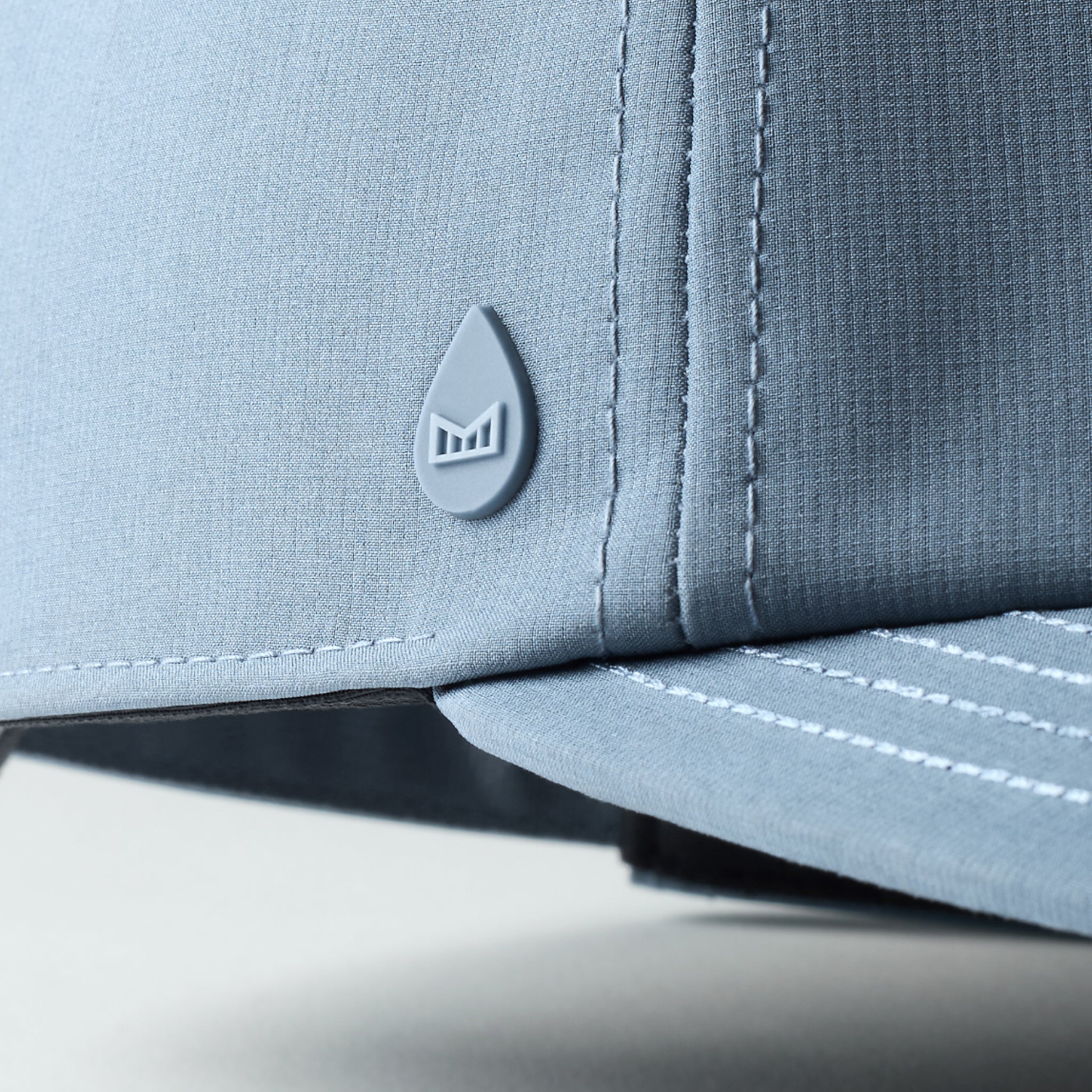 melin Legend Hydro Blue Stone Gum dad hat