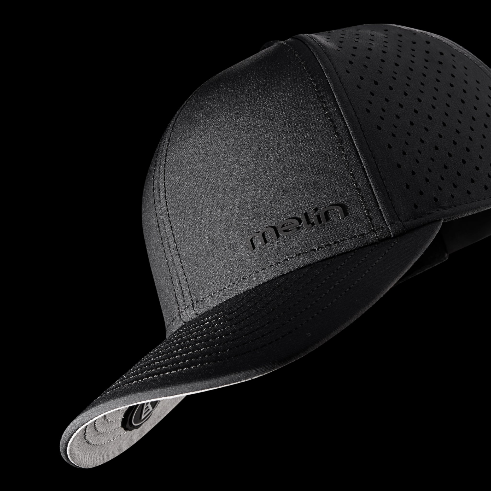 The front, angled view of the melin Compass Hydro in Black, set against a black background